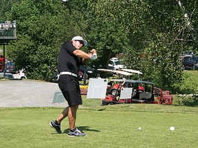 Mike Richards practices his shot before teeing off at the first hole during the 2013 Mike Richards Charity Golf Tournament at the Kenora Golf and Country Club on Thursday, July 11.
GRACE PROTOPAPAS/Daily Miner and News