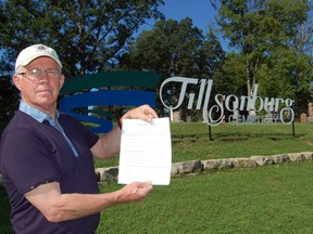 Paul DeCloet, chair of the cemetery sign sub-committee, holds a copy of the survey the Town of Tillsonburg is conducting to obtain feedback and public opinion on the new cemetery signage that was installed last year. The survey was released on Monday, July 8, 2013 and is available on the Town website or at any Town office until Friday, August 9, 2013. 

KRISTINE JEAN/TILLSONBURG NEWS/QMI AGENCY