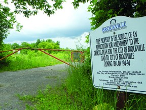 A sign informs the public of the proposed site of concrete and asphalt plants in Brockville. (THOMAS LEE/The Recorder and Times)