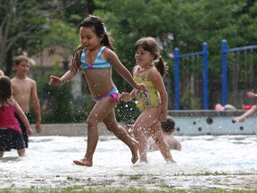 In a file photo, children play at a wading pool. (Winnipeg Sun files)