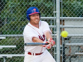 Portage Phillies Dan Fedak swings for the ball during Thursday night's game against Winnipeg's Stealers. (Svjetlana Mlinarevic/Portage Daily Graphic/QMI Agency)