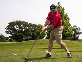 Kingston native Kirk Muller, head coach of the NHL’s Carolina Hurricanes, was one of the many players  who teed off at the Syl Apps Celebrity Golf Tournament at Garrison Golf and Curling Club Friday. (Sam Koebrich/For The Whig-Standard)