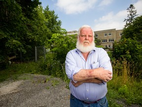Gary Haggart stands in front of what would become a second entrance to the Sisters of Providence property.