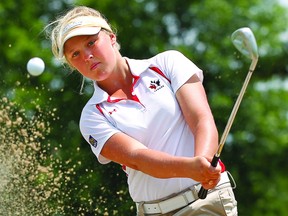 Brooke Henderson of Smiths Falls makes a shot during a photo shoot in 2012. The Smiths Falls phenom on Friday made the cut at the Manulife Financial LPGA Classic in Waterloo. (QMI AGENCY file photo by Tony Caldwell)