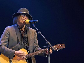 American singer/songwriter Sixto Rodriguez, the subject of Searching for Sugar Man, performs on stage in Cape Town, South Africa on Feb. 9, 2013.