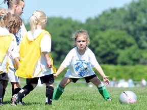 Goalkeeper Elizabeth Newcombe, 4, right, watches a shot during the final day of the Chatham Soccer Academy on Friday at the Chatham-Kent Community Athletic Complex. The ninth annual week-long camp had more than 150 players, including some from the Children's Treatment Centre of Chatham-Kent and the municipality's A.L.L. For Kids program who are sponsored by the camp. (MARK MALONE/The Daily News)