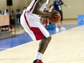 Canada's Mangisto Arop prepares to take a shot during Universiade 2013 basketball action in Kazan, Russia. Matt Zambonin/Freestyle Photography