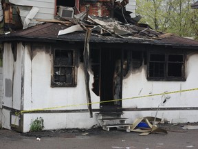A 48-year-old woman died in a fire police say was deliberately set at 606 Wellington St. E. in May 2011. The city's top building official wants the two-storey building to come down. (PHOTO: MICHAEL PURVIS/THE SAULT STAR)