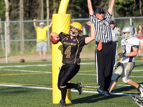 North Bay Jr. Varsity Bulldogs running back John Phillips celebrates a touchdown Saturday during a 54-14 loss to the Halton Cowboys at Steve Omischl Sports Field Complex.