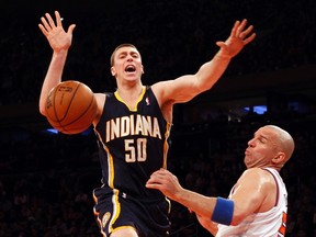 Newly acquired Tyler Hansbrough (left) will be relied on to bring toughness to the Raptors this coming season. (REUTERS)