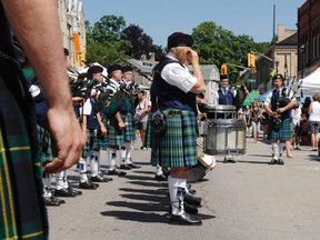 The Paris Port Dover Pipe Band performs for the Paris Streetfest crowd on Saturday, July 13, 2013. (HUGO RODRIGUES Brantford Expositor)