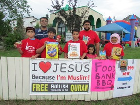 Markaz-ul-Islam’s Muhammad Ehtisham and Junaid Shahid at the fundraising barbecue with eager volunteers. PHOTO SUPPLIED