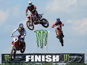 Racing in Round 5 of the Monster Energy Motocross Nationals at Gopher Dunes Sunday are, from left, in the second MX1 moto: Tyler Medaglia (3rd), Mike Sottile (5th) and David Gassin (32nd). CHRIS ABBOTT/TILLSONBURG NEWS