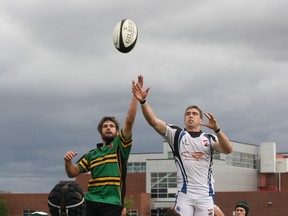 Jared Walsh of the Fort McMurray Knights battles with Frank Edwards of the Edmonton Leprechaun-Tigers for possession of a lineout during Saturday’s game  at the Westwood rugby pitch. Robert Murray/Today Staff