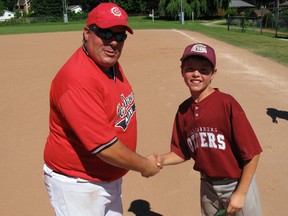 Shawn Knelsen, 9, of the Tillsonburg Otters, was named MVP for his team in the final game of the first annual mosquito baseball tournament put on by the Port Dover Minor Baseball Association on the weekend. Scott Cunningham, coach of the Port Dover Sailors, presented Knelsen with the award on Sunday, July 14, 2013. The Otters lost to the Sailors 13-3 in the final game. DANIEL R. PEARCE Simcoe Reformer
