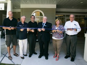 The ribbon is cut at Bayfield's new library. Pictured, from left: Huron-Bruce MP Ben Lobb, Bayfield Ward Coun. Geordie Palmer, Architect Brad Skinner, Bluewater Mayor Bill Dowson, Huron-Bruce MPP Lisa Thompson and Huron County Warden George Robertson.