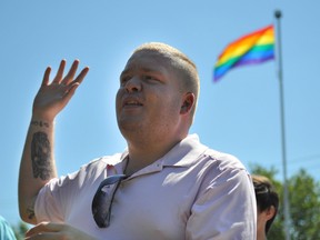 Leigh Bursey gives a short speech after the rainbow flag was raised behind city hall in Brockville to kick off Brockville Pride Week in this file photo. Recorder and Times file photo