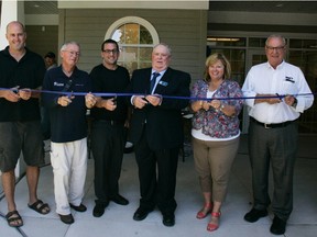The ribbon is cut. Pictured, from left: Huron-Bruce MP Ben Lobb, Bayfield Ward Coun. Geordie Palmer, Architect Brad Skinner, Bluewater Coun. Bill Dowson, Huron-Bruce MPP Lisa Thompson and Huron County Warden George Robertson.
