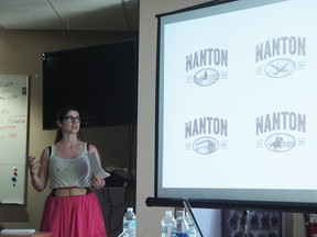 ZGM Collaborative showed council and Town staff the four new logos they proposed for the Town of Nanton. Shown here is Kristen Thompson, who was discussing the four final proposals, and the red brick colour.