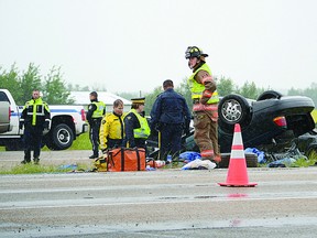 Two people are dead after two vehicles collided on Highway 16 at Range Road 213 early Monday afternoon. Steven Wagers/Sherwood Park News/QMI Agency