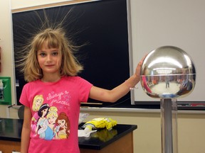 Science Timmins Summer Camp is a hair-raising experience for local students such as Sophie Lapointe, got to test out the Van de Graaf electrostatic generator on Monday. The camp is being held throughout the summer at École secondaire catholique Thériault.