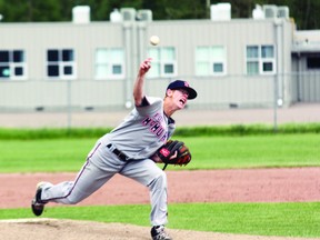 Daniel Morris delivers a pitch during Saturday’s 9-8 victory over the Okotoks Dawgs White at Ron Morgan Park. ROBERT MURRAY/TODAY STAFF
