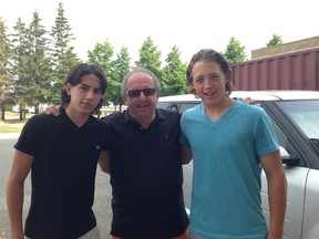 Sherry Bassin, general manager of the Erie Otters of the Ontario Hockey League, was in Sault Ste. Marie recently to check up on two of his team’s selections from the 2013 draft. Bassin (middle) caught up with forward Frankie Pucci (left) and defenceman Owen Headrick (right.) Pucci and Headrick were both drafted by Erie from the Soo Thunder minor midget team.