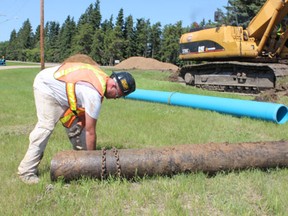 Crews removed an old waterline while working on installing waterlines on Spruce Haven Road in Melfort on Thursday, July 11.