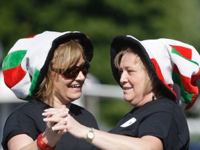 Rosa Ferranti and Diane Cristillo dance to the singing of Fabio Trioli during Sunday’s Italian Festival at the Marconi Club. With temperatures soaring the two members of the Elettra Marconi Society danced in the heat of the early evening. Hundreds attended the annual event to celebrate Italian culture.