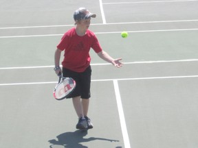 The Southampton Tennis Club held their first Jr. singles tornament of the season July 11. Pictured is Spencer Sutter running for the tennis ball and wins the match 4-0.