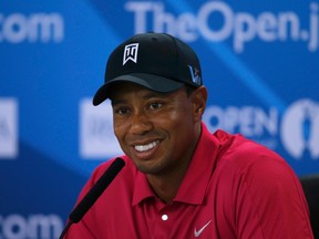 Tiger Woods of the U.S. speaks during a news conference following a practice round ahead of the British Open golf championship at Muirfield in Scotland July 16, 2013. (REUTERS)