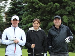 Left to right: Scott Hamilton of Hopewell Communities, Wendy Yaremchuk of The Edmonton Sun and Christopher Wigeland of Sabal Homes were a few of the attendees at the tournament. (Supplied photo).