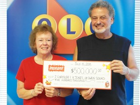 Kaye Jones and Jack Chrylser of Owen Sound with their $500,000 OLG cheque this week. The couple won the money on a scratch ticket purchased at Vince's Kwik Mart last Friday. OLG photo.