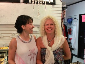 Shirley Cunningham, left, laughs with her employee, Lois Davois. Cunningham says she has really enjoyed serving the customers in the Whitecourt area but is closing the business for health reasons.