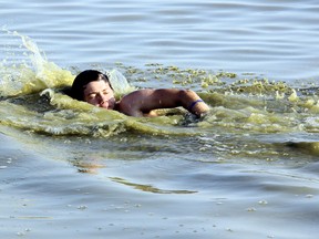 Cornelius Unger, 18, of Blenheim described the water at the Erieau public beach as "gross" when he showed up for a swim Monday evening. VICKI GOUGH/ THE CHATHAM DAILY NEWS/ QMI AGENCY