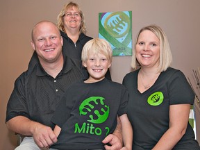 Chris and Stephanie Roung of St. George, pictured with their nine-year-old son, Carter, have opened the MitoCanada national office on St. Paul Avenue in Brantford, and have hired Vicki Spadoni as executive director. (Brian Thompson, The Expositor)