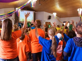 Students and volunteers of the Vacation Bible School sing and dance on the final day of camp at the Cornerstone Baptist Church on Friday, July 12. DANIELE ALCINII/FAIRVIEW POST/QMI AGENCY