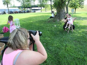 Yvonne Morassut and her daughter Suzie, 1 1/2, had their photo taken Wednesday at Lee Park during Portraits in the Park, a fundraiser for the family of a North Bay man battling brain cancer. (MARIA CALABRESE The Nugget)