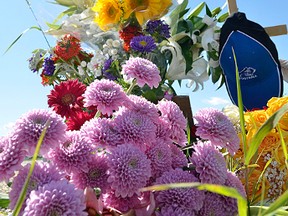 A roadside memorial at the intersection of Highway 16 and Range Road 213, set up in memory of Logan Torresan, 14, and Dalin Torresan, 17, two Strathcona County, Alta. brothers who died in a Monday, July 15, 2013 collision at that location. Michael Di Massa/Sherwood Park News/QMI Agency