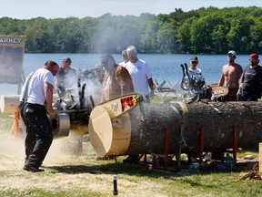 It wasn't all fun under the sun in Blind River. Participants sawed their way through wood during the lumberjack competition.
Photo by KEVIN McSHEFFREY/THE STANDARD/QMI AGENCY