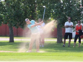 Dakota Cameron shoots of a bunker on the 18th hole at the Melfort Golf and Country Club during the third day of play at the 102nd Men's Amatuer Championship on Wednesday, July 17.