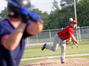 Latta Rivermen starting pitcher Marcus Sullivan throws in the third inning of South Hastings Baseball League action between Latta (red jerseys) and Electrical Utilities Contracting in Melrose (Tyendinaga Township) Tuesday evening, July 16, 2013. Latta won 11-2 over EUC. - JEROME LESSARD/The Intelligencer/QMI Agency