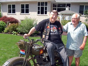 Second World War veterans and former dispatch riders Harry Watts of Kitchener; left and George Burgess of Tillsonburg, share a laugh Tuesday afternoon in Tillsonburg. The veterans joined Jeremy Van Dyke of Cambridge, owner of the 1943 Ariel military motorcycle seen here and used by dispatch riders during the Second World War.   

KRISTINE JEAN/TILLSONBURG NEWS/QMI AGENCY