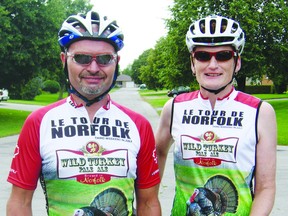 Tour de Norfolk organizers John Walker and Yvette Mahieu model the new jerseys for this year's event. The annual cycling tour will be held this weekend, starting in Delhi. (Contributed photo)