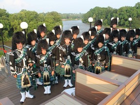 The Paris Port Dover Pipe Band model their new uniforms ahead of their departure for Switzerland to perform in the Basel Tattoo from July 19 to 27. MICHAEL PEELING/The Paris Star/QMI Agency