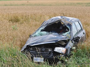 Two occupants of this Kia SUV were treated and released from Stratford General Hospital after a single-vehicle rollover south of Mitchell Wednesday. (HILARY LONG QMI Agency)
