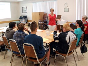 Donna Durand, executive director of the Alberta Council on Aging, leads a class of Freson Bros. Southview IGA employees in a Train the Trainers Seminar at the Grande Prairie & District Golden Age Centre on Thursday. The aim of the seminar is to help employees develop the service skills they need to satisfy their senior customers and clients. Southview IGA is the first group to receive training under the revised program. (Caryn Ceolin/Daily Herald-Tribune)