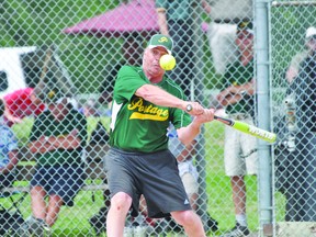 Portage Agri-Sales' Don Giercke takes a swing during the Agri-Sales finale in the Portage Senior Slo-Pitch Tournament July 18. (Kevin Hirschfield/The Graphic/QMI AGENCY)