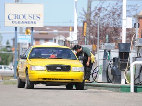 A Yellow Cab gets gas at Fas Gas on 100 Street in Grande Prairie, Wednesday. The city is talking about partnering with the cab industry to create fully accessible taxis. AARON HINKS/DAILY HERALD-TRIBUNE