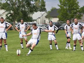 Tyler Ouellete kicks a penalty goal last Saturday during a 46-8 loss to the Edmonton Leprechaun Tigers at home. The Knights will be looking to get back to .500 this weekend when they host the Edmonton Pirates. ROBERT MURRAY/TODAY STAFF